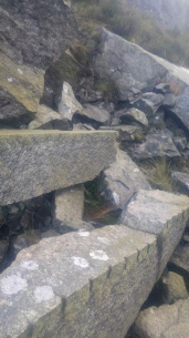discarded slabs of granite split by the plug and feather method